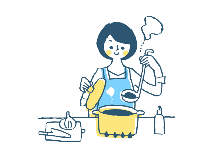 煮込み料理をする女性
